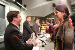 Panelists speak with attendees. Picture by Alina Chan.